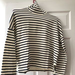 Soft turtleneck with blue stripes